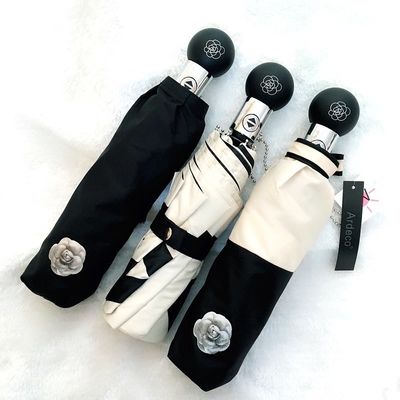 Защищайтесь в стиле Камелия Ультрафиолетовая защита Трехслойный зонтик для корейских женщин