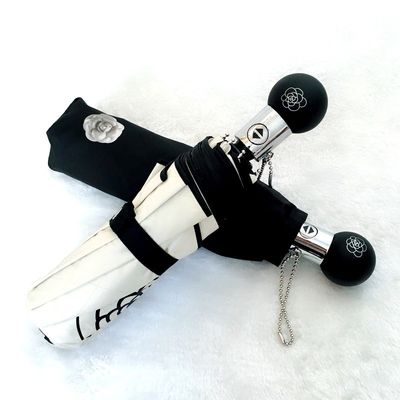 Защищайтесь в стиле Камелия Ультрафиолетовая защита Трехслойный зонтик для корейских женщин